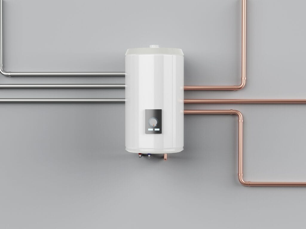 Benefits of Tankless Water Heaters for Energy-Efficient Homes 8 A modern white tankless water heater mounted on a gray wall with copper and silver pipes, perfect for energy-efficient homes.
